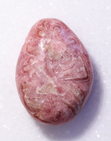 Rhodochrosit-Trommelstein mit Bohrung